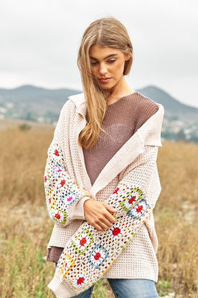 Cream crochet floral knit cardigan with long sleeves