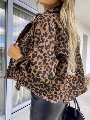 Side view of raw hem leopard collared denim jacket