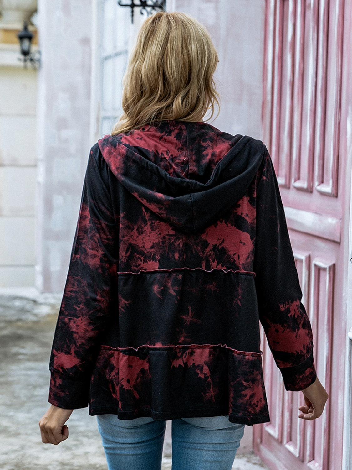 Back view of shiny drawstring printed zip-up jacket