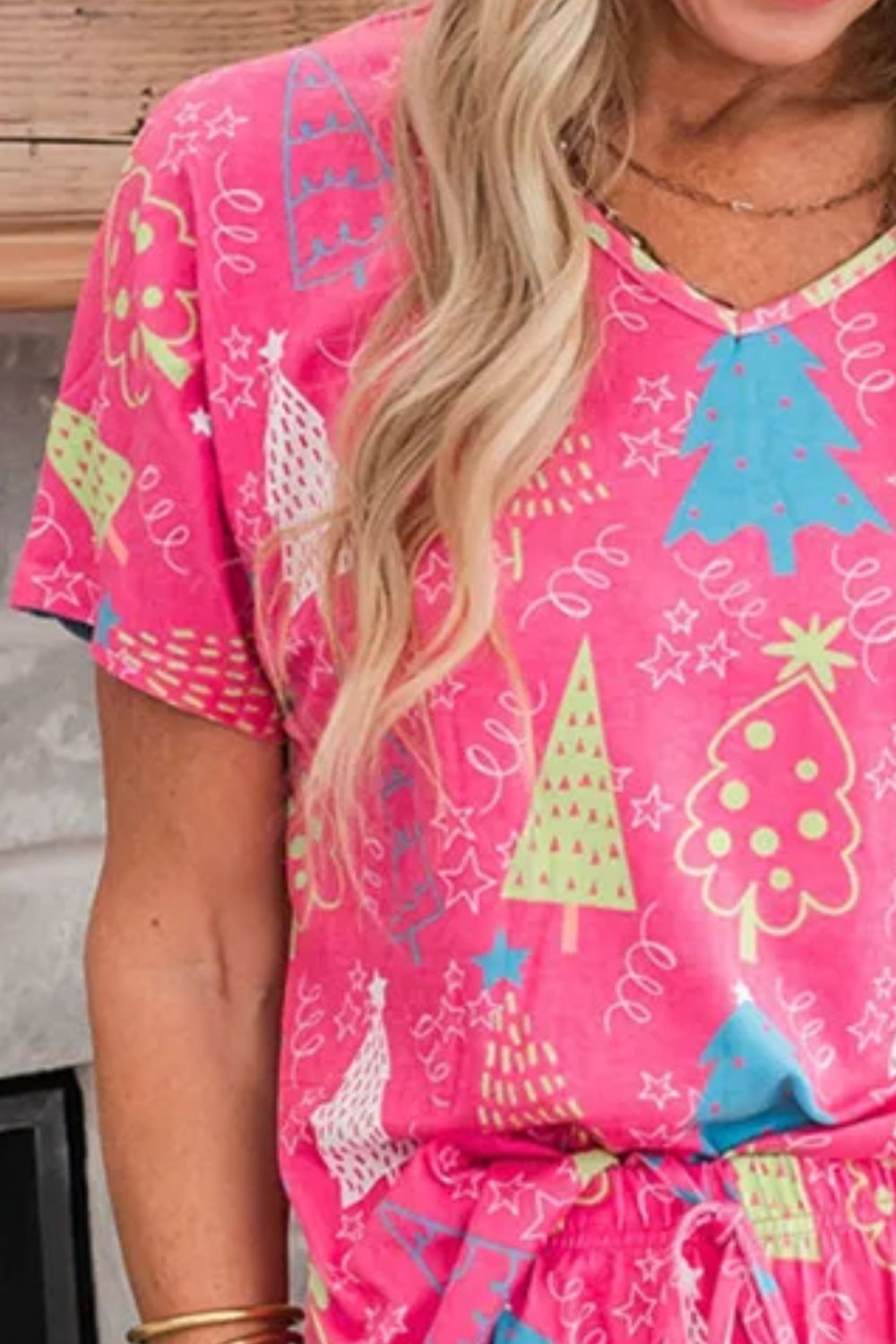 V-neck short sleeve top with vibrant tree designs