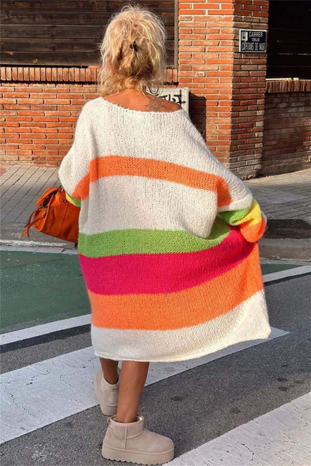 Back view of colorful striped sweater dress, casual look.