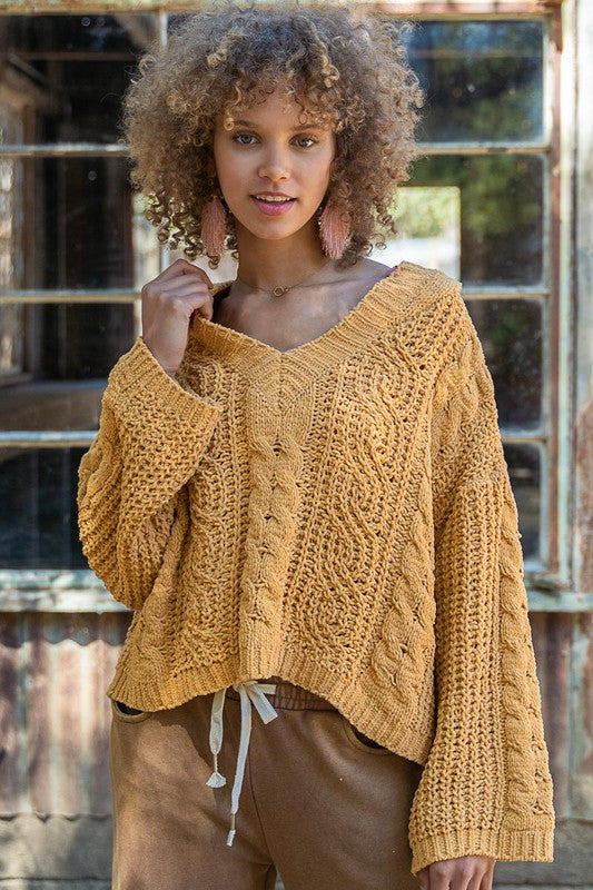 Yellow twisted knit sweater with V-neck design