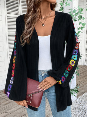 Cardigan with embroidery and clutch accessory