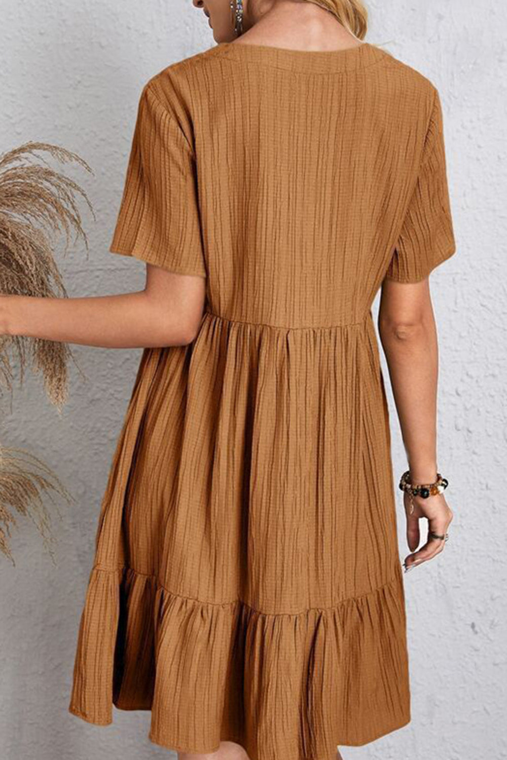 Back view of brown ruched V-neck short sleeve midi dress