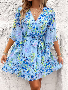 Light blue floral ruffled surplice mini dress with half sleeves