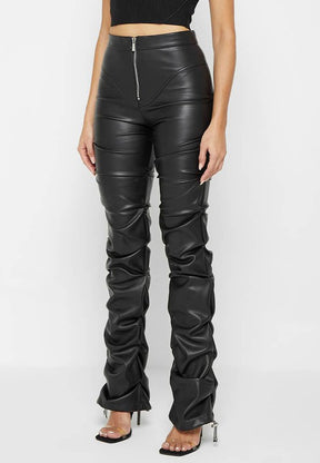 Side view of sexy PU leather pants, high waist, skinny fit