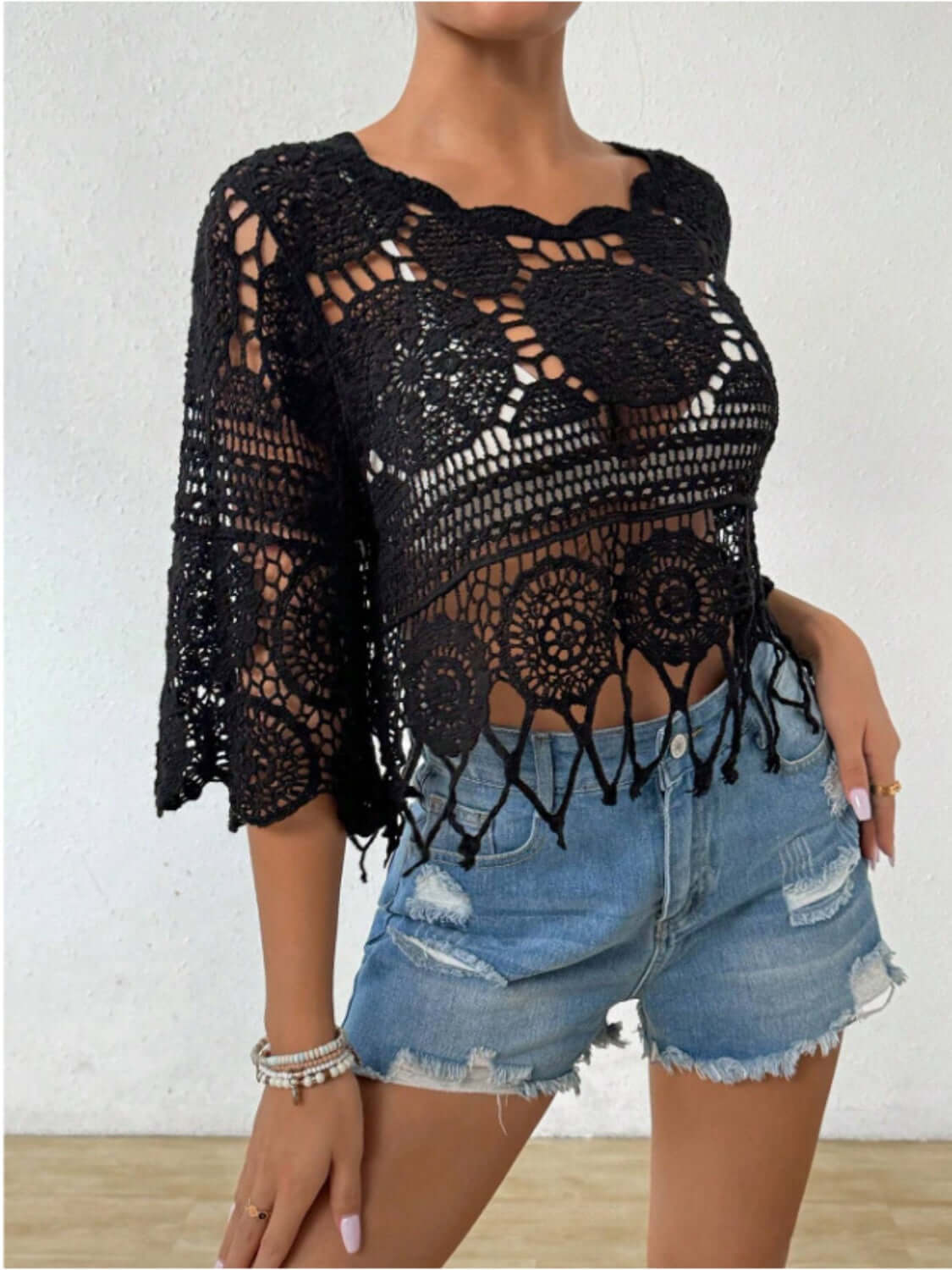 Black openwork round neck cover-up with intricate design