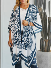 Printed open front cover-up with blue floral design