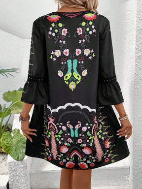 Black lace detail printed dress with colorful patterns