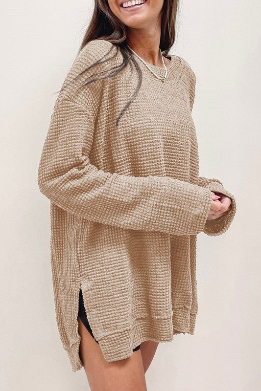 Beige waffle knit oversized top with drop sleeves and side slits