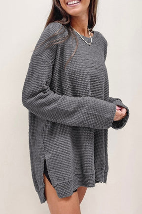 Gray waffle knit oversized top with drop sleeves and side slits