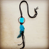 Brown leather necklace with turquoise slab and feather