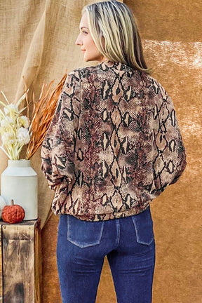 Choker neck dolman sleeve snake print top, back view