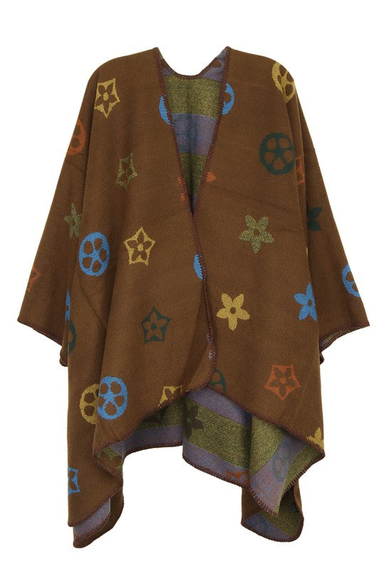 Brown poncho with vibrant geometric designs