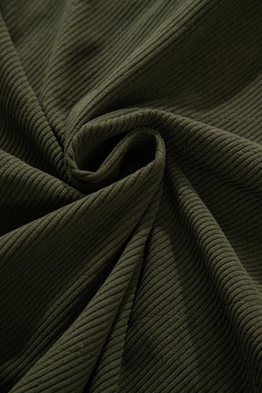 Detail of green corduroy fabric on jacket