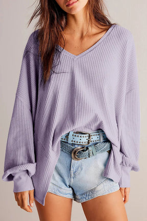 Lavender waffle-knit V-neck long sleeve top with denim shorts