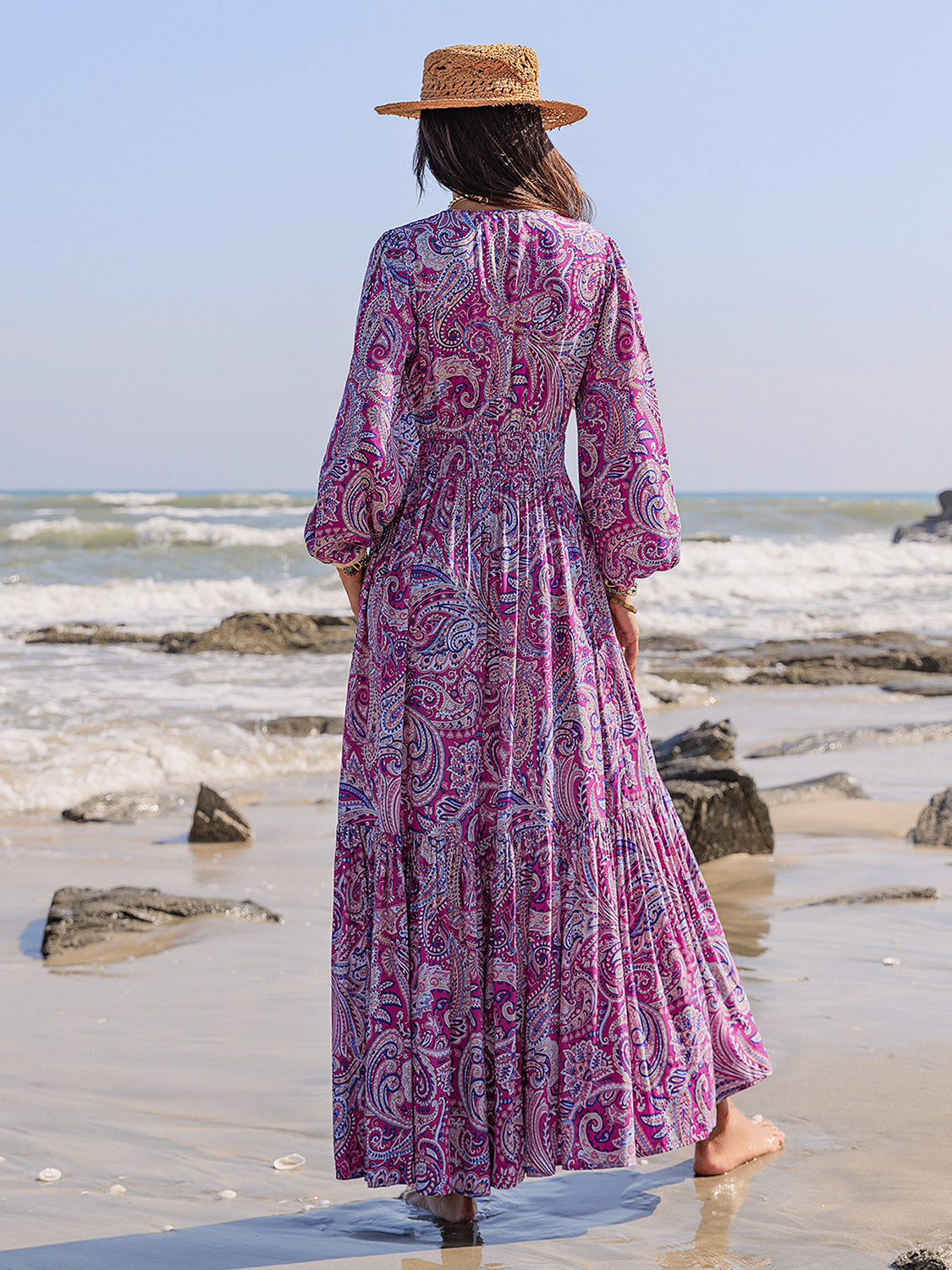 Back view of printed tie neck balloon sleeve maxi dress