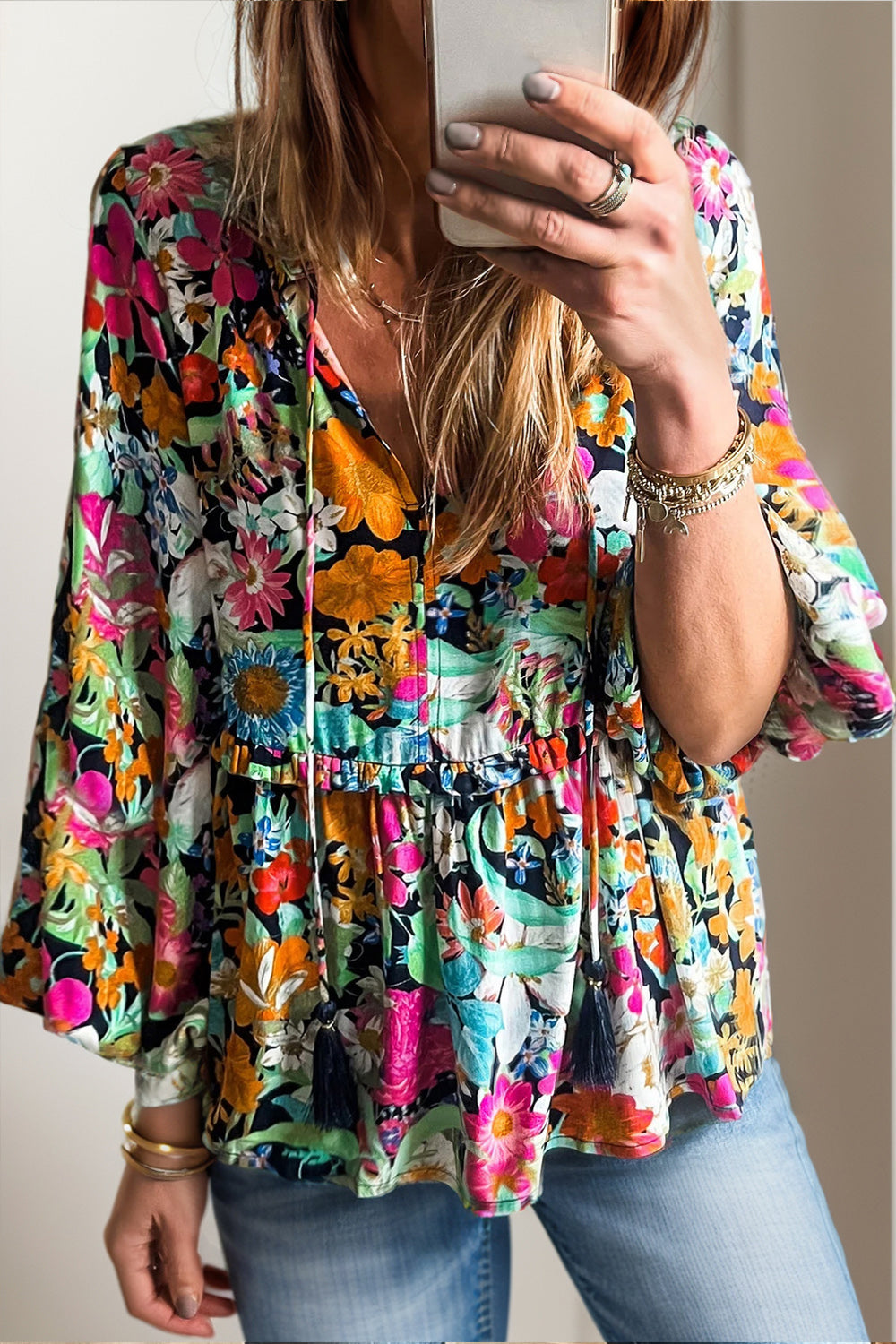 Floral printed tie neck blouse with long sleeves