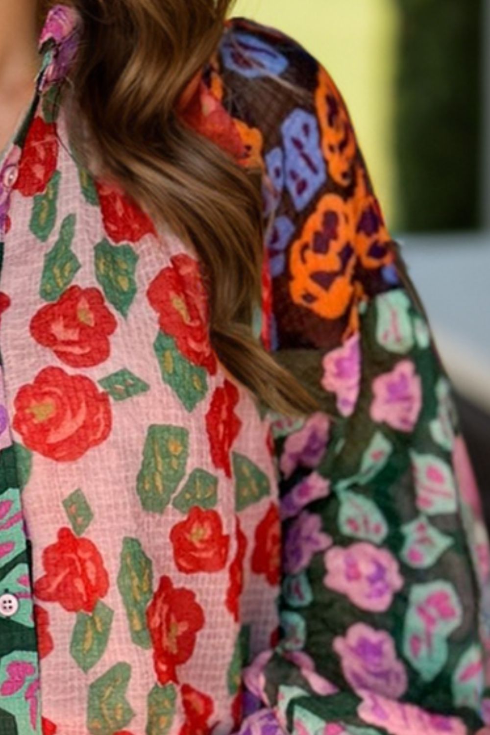 Detailed view of floral printed blouse fabric