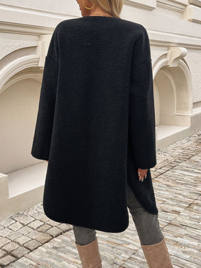 Black button-up long sleeve coat back view