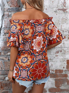 Back view of printed off-shoulder half sleeve blouse