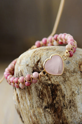 Rose Quartz Heart Beaded Bracelet on stone