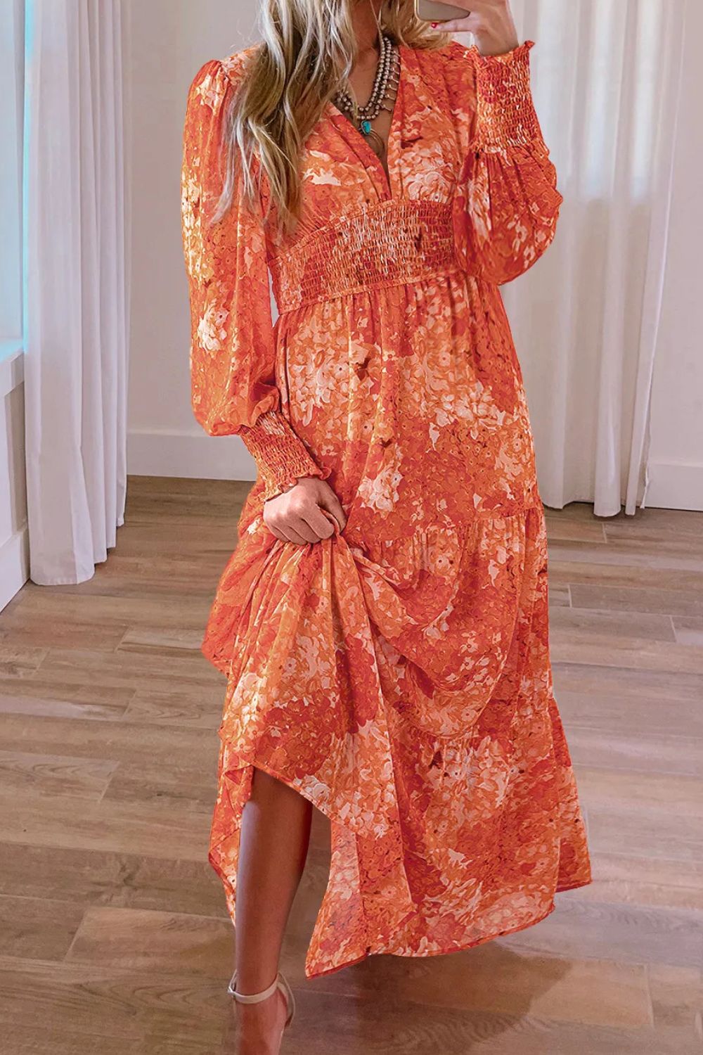 Smocked printed V-neck long sleeve dress worn by model