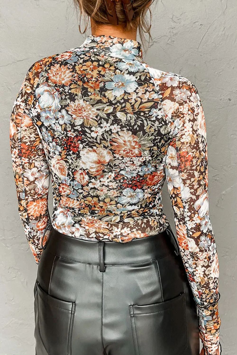 Floral mock neck long sleeve top, back view