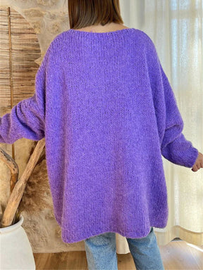 Back view of purple V-neck sweater