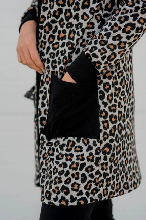 Pocket detail on leopard print open front cover-up