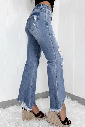 Distressed raw hem wide-cut jeans side view