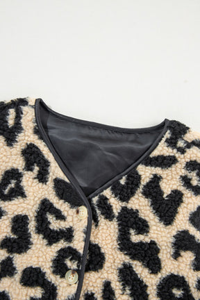 Close-up of leopard button up vest coat fabric