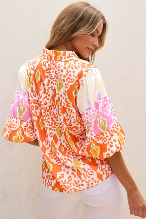 Colorful printed notched half sleeve blouse, back view