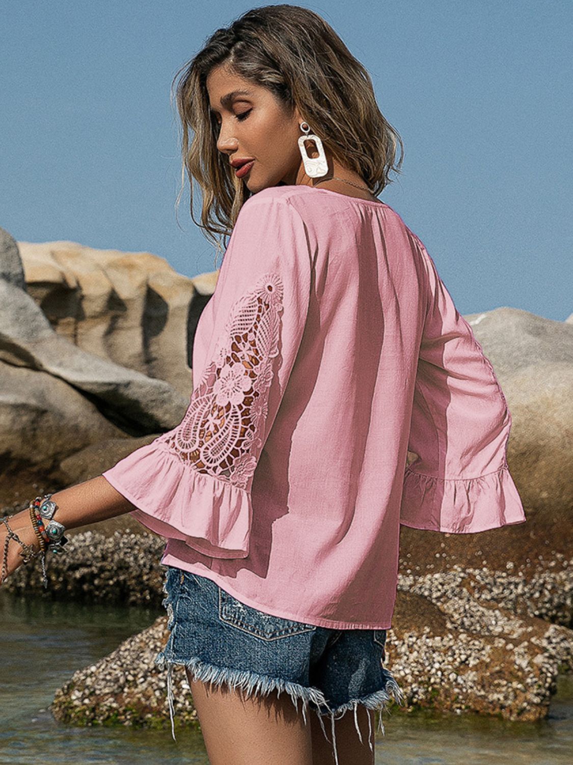 Pink V-neck lace flounce sleeve blouse, back view