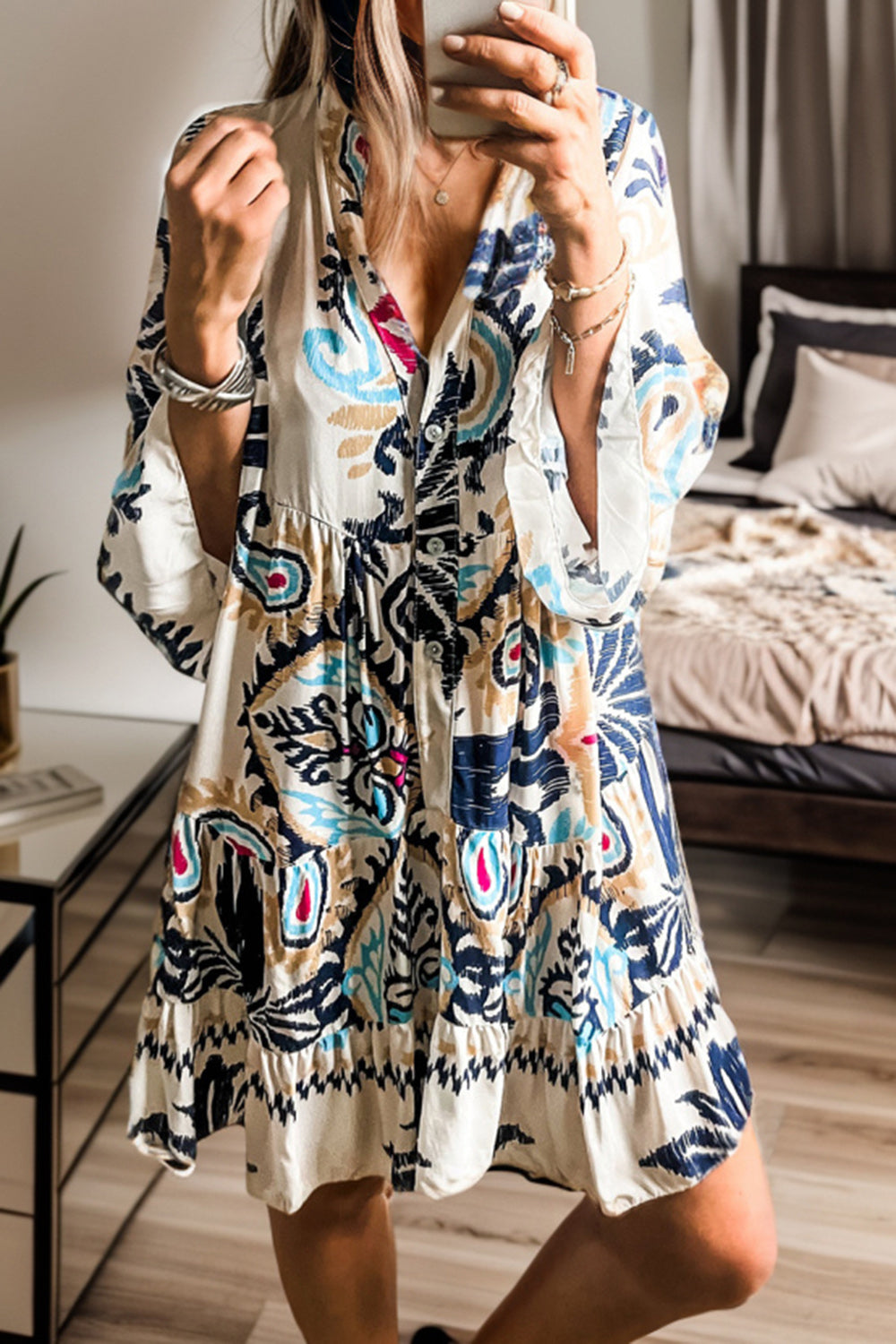 Stylish printed button up mini dress with vibrant patterns