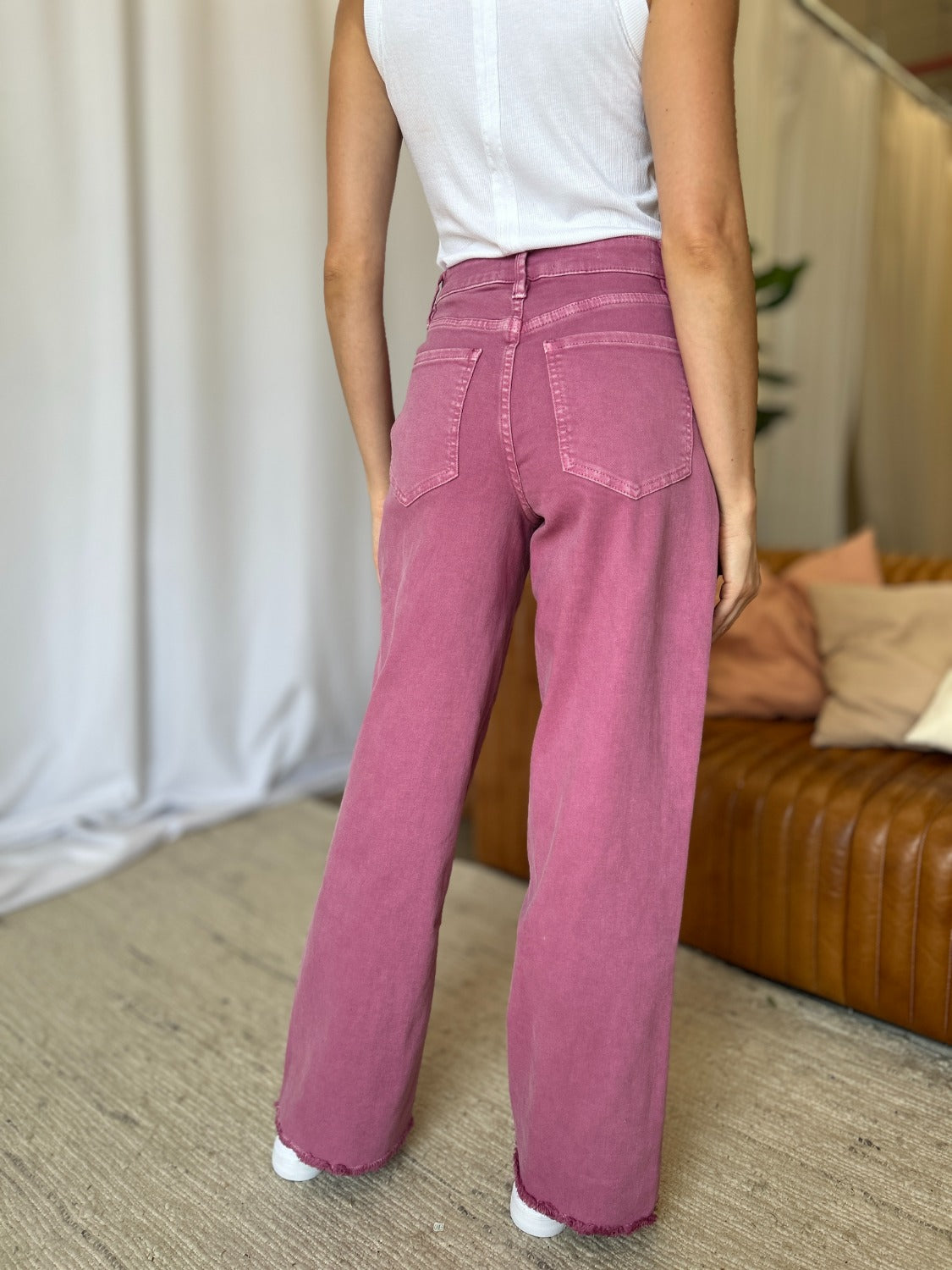 Back view of RFM high rise wide leg jeans in French Rose.