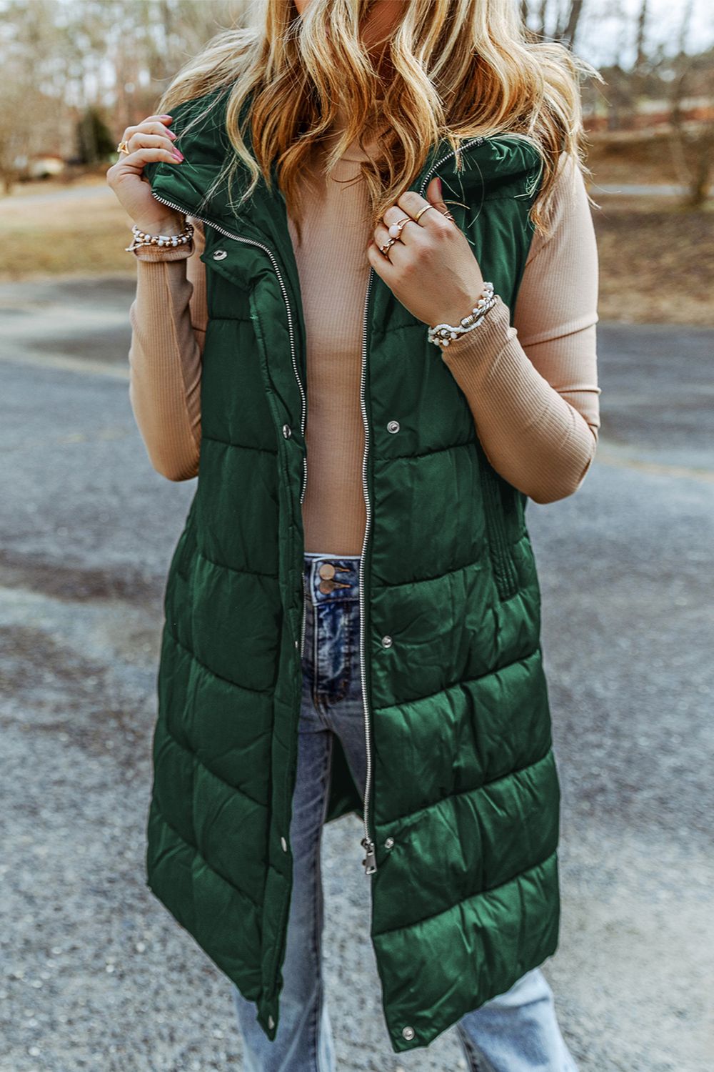 Green longline hooded sleeveless puffer vest, front view