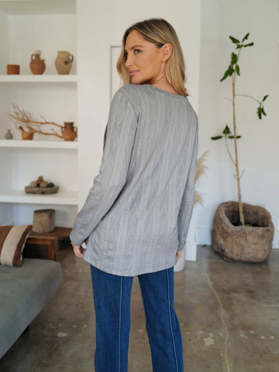 Back view of gray slit round neck long sleeve t-shirt