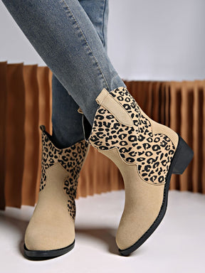 Elegant leopard print suede boots with low block heels.