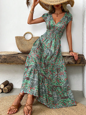 Green smocked cap sleeve midi dress with paisley design