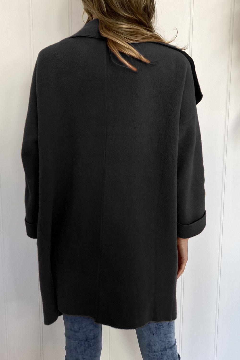 Back view of black waterfall collar brushed longline coat