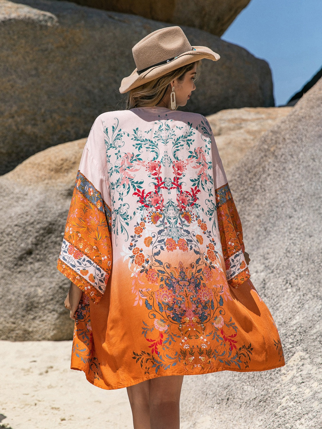 Back view of printed long sleeve cover-up