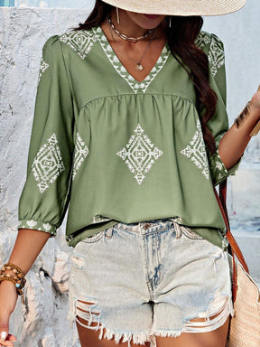 Green printed V-neck three-quarter sleeve blouse