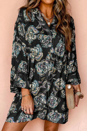 Floral printed button-up black shirt dress with three-quarter sleeves.