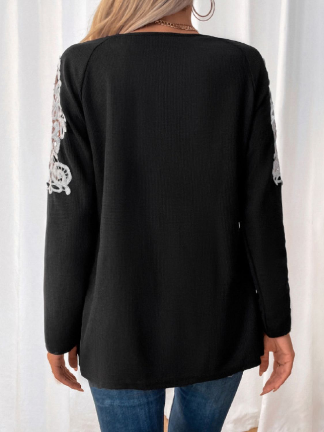 Black lace detail quarter zip long sleeve top, back view