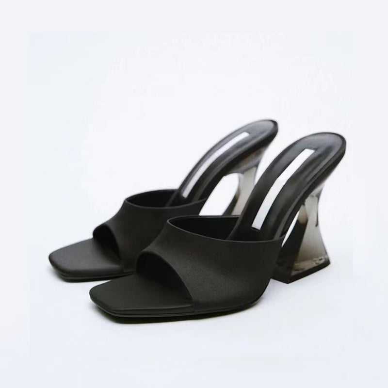 Black open toe high heel sandals with clear block heel