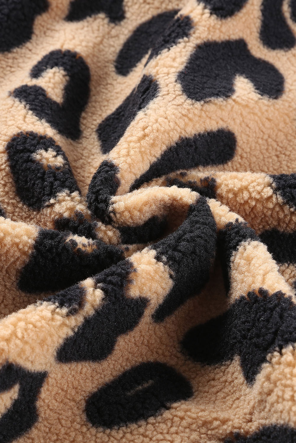 Close-up of leopard print fabric texture