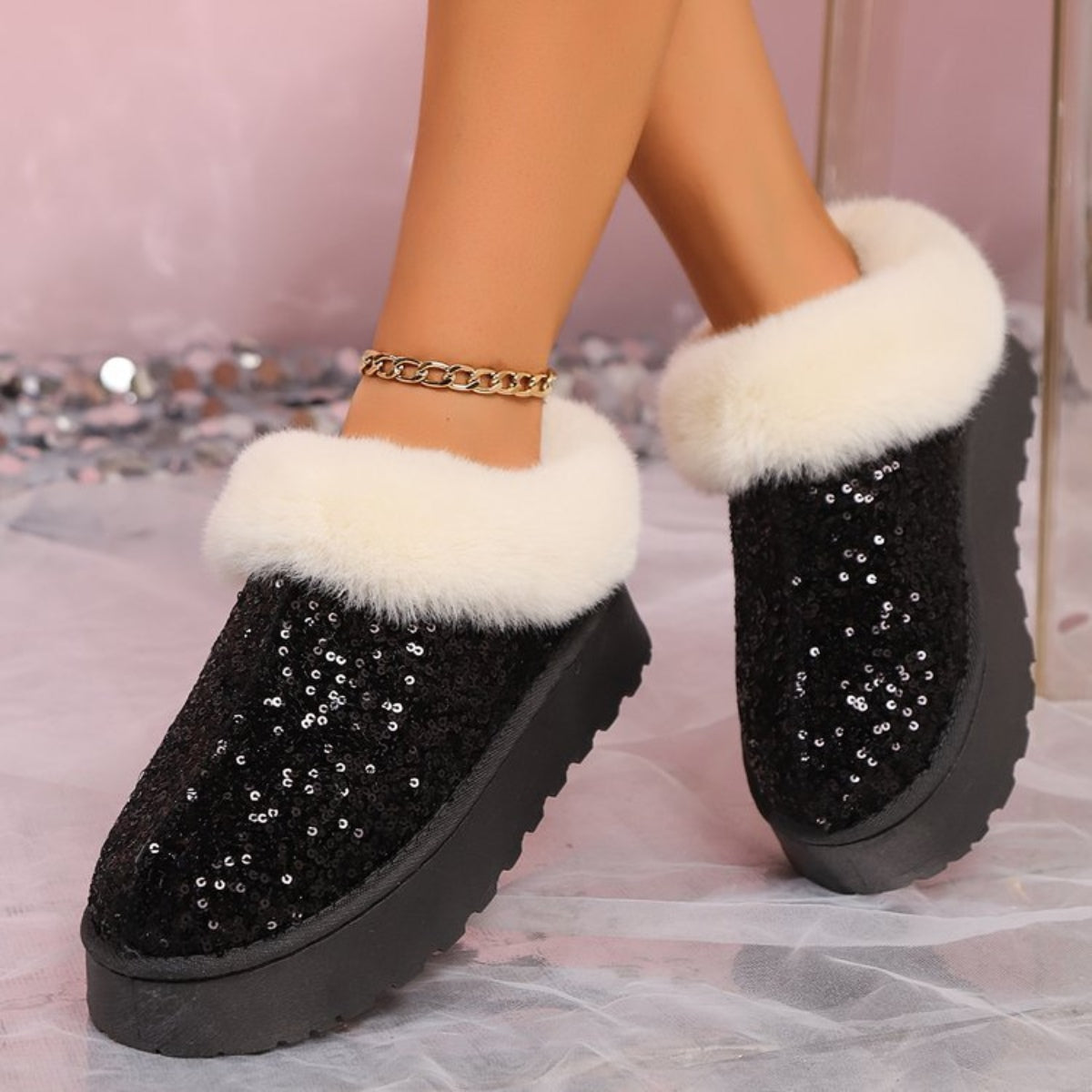 Chic black sequin boots with plush trim