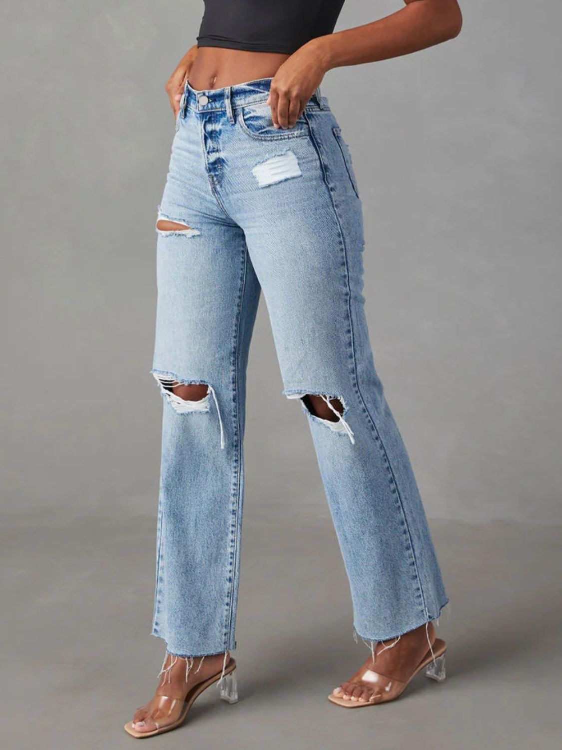 Distressed straight leg jeans with pockets, side view