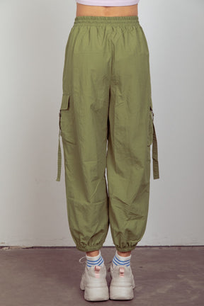 Back view of green elastic waist woven cargo pants